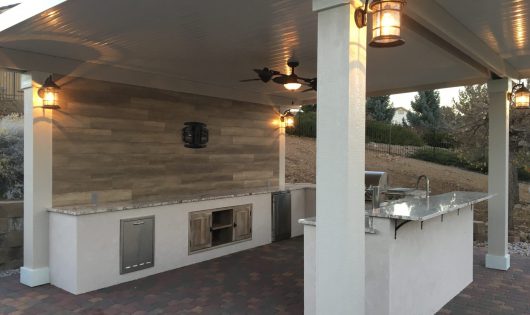 Outdoor kitchen illuminated underneath Alumawood